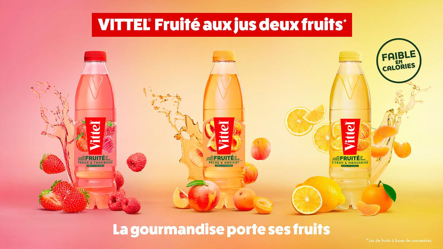 Bouteilles Vittel Fruité avec fruits.