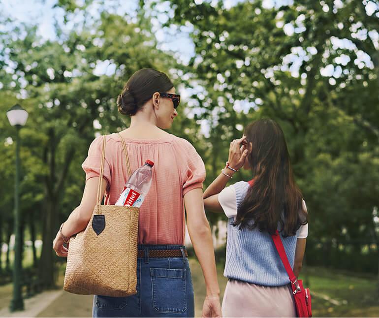 mother and daughter are walking
