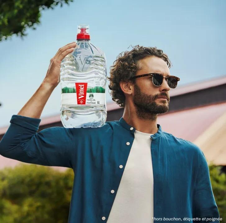 man with a bottle of water